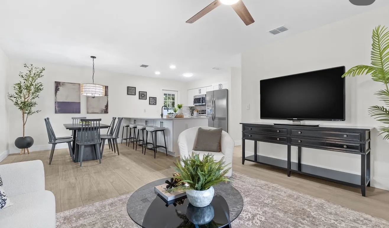 Open living and dining remodel by CWL Construction